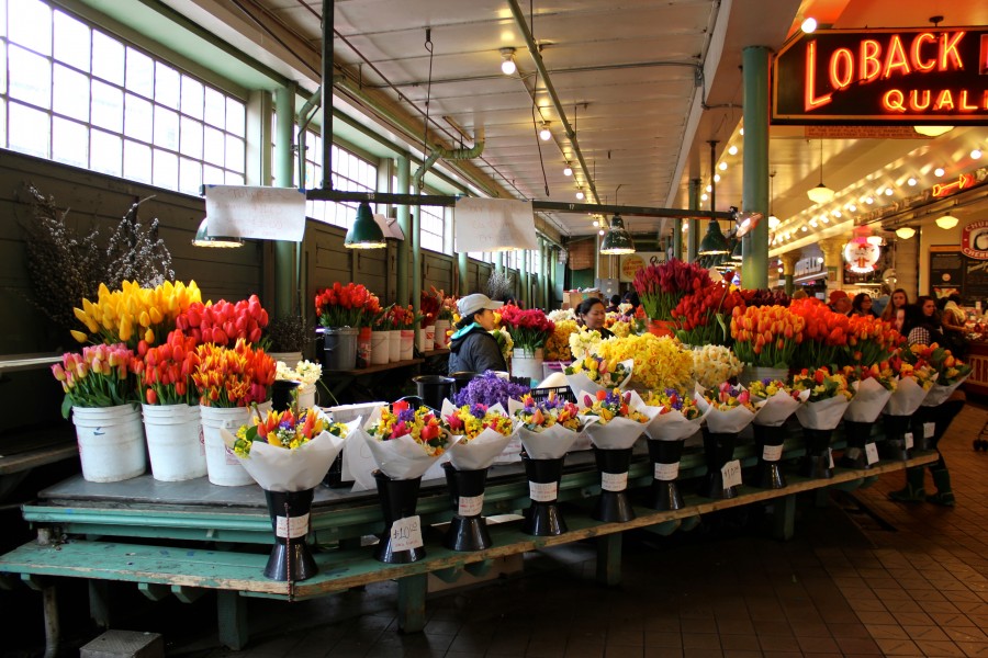 Flowers being sold in Pike Place Market in Seattle, Washington, United States via ZaagiTravel.com