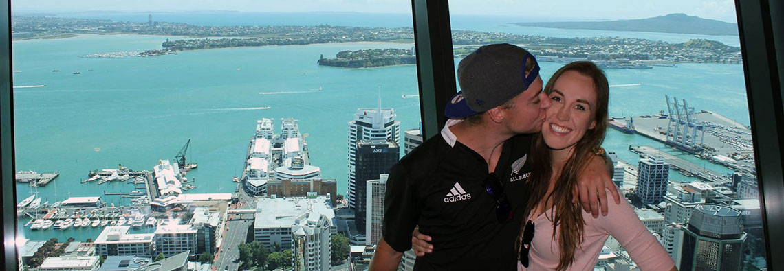 James and Alexa Rae at the top of the Sky Tower in Auckland, New Zealand via ZaagiTravel.com